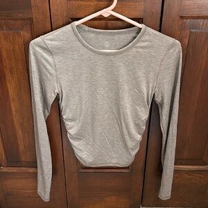 Lululemon long sleeve, cropped with sinched side
